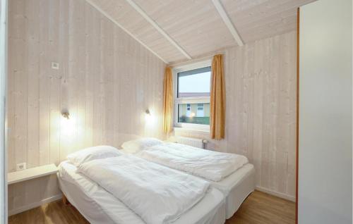 Voodi või voodid majutusasutuse Friedrichskoog-strandpark 8 toas