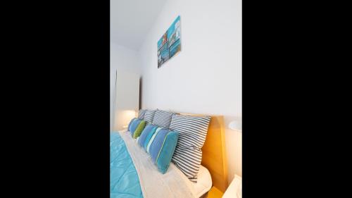 Postel nebo postele na pokoji v ubytování Beach House with Seaview