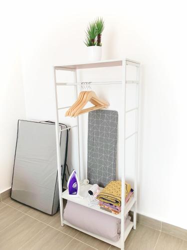 Фотография из галереи Netflix Two Bedroom Troika Kota Bharu Homestay 182 в Кота-Бару