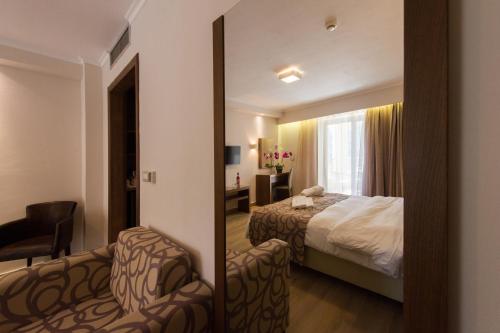 Adams Hotelにあるベッド