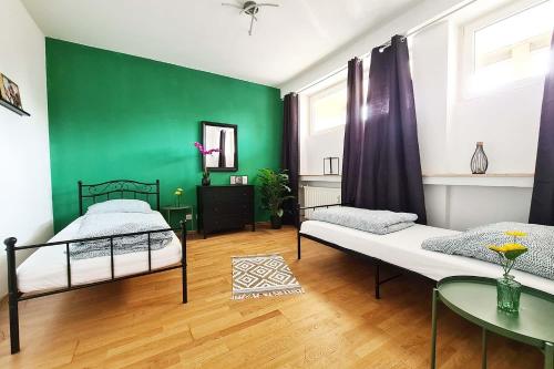 Giường trong phòng chung tại Langenfeld Apartment