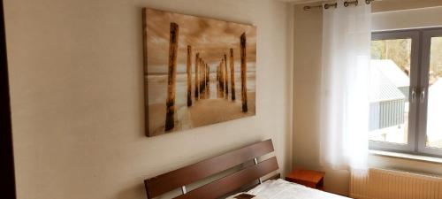 Posteľ alebo postele v izbe v ubytovaní Apartament przy plazy