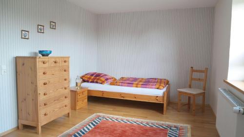 Tempat tidur dalam kamar di Nordsee-1