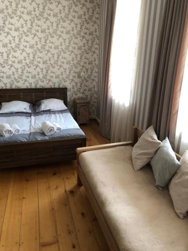 Postel nebo postele na pokoji v ubytování Hill House