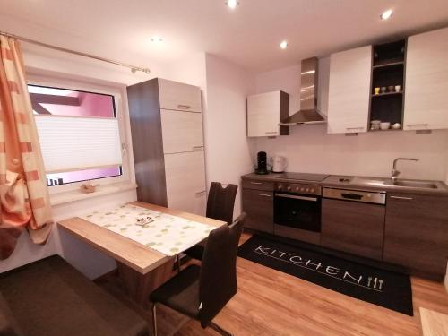 Kuchyň nebo kuchyňský kout v ubytování Sonnfeld Appartement