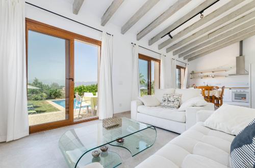 Seating area sa YourHouse Can Covetes, villa with private pool and garden, perfect for families