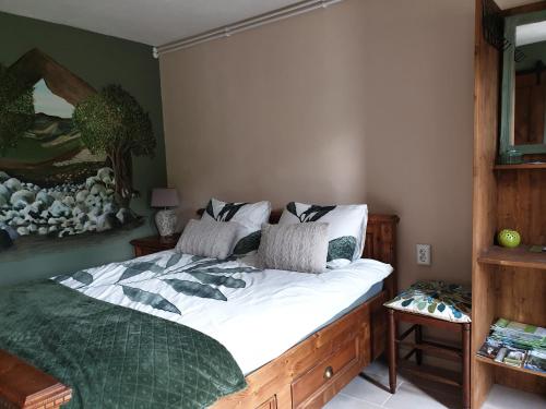 Postel nebo postele na pokoji v ubytování B&B Margarita
