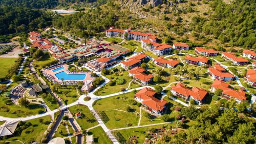 an aerial view of a house with red roofs at TUI BLUE Sarigerme Park in Dalaman