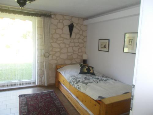 Postel nebo postele na pokoji v ubytování Haus am Luch