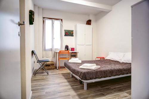 Posteľ alebo postele v izbe v ubytovaní Bologna City Center Apartment by Wonderful Italy