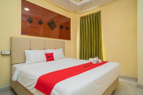 Krevet ili kreveti u jedinici u objektu RedDoorz Plus Syariah near Pasar Turi