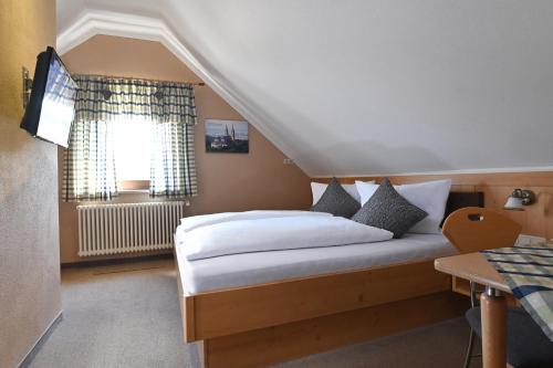 Ліжко або ліжка в номері Landgasthof Zur Scheune