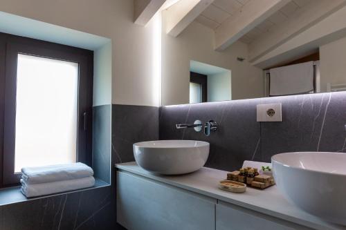 Ванная комната в Le Stanze del Lago Villa Seta