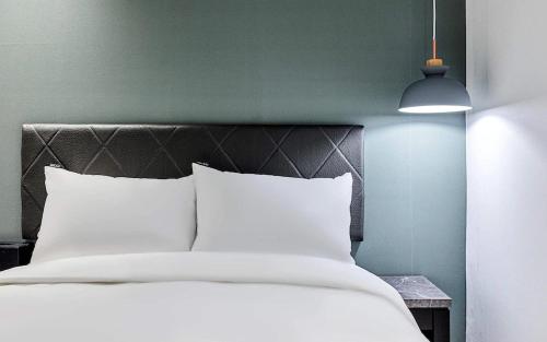 Cama o camas de una habitación en Hotel WO Yongsan Station