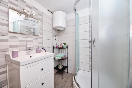 Et badeværelse på Apartment Mediterranean