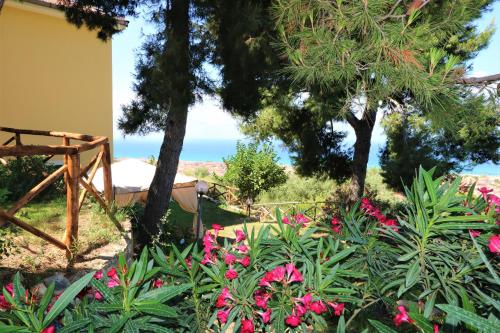 a view of the ocean from the garden at Antico Portale in Ascea