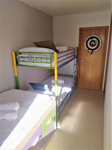 Cama o camas de una habitación en Lo Petit Delta