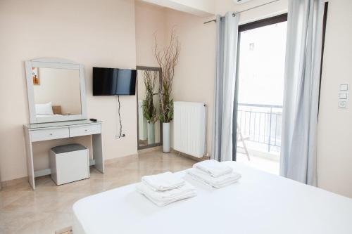 Postel nebo postele na pokoji v ubytování Great Apartment in Piraeus