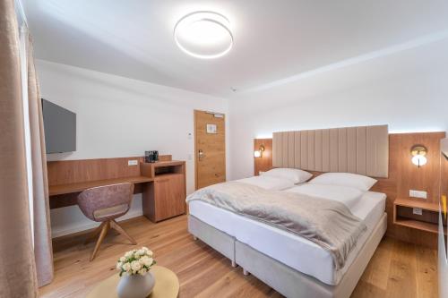 Postel nebo postele na pokoji v ubytování das mondsee