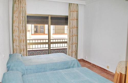 Postel nebo postele na pokoji v ubytování Apartamento Santa María