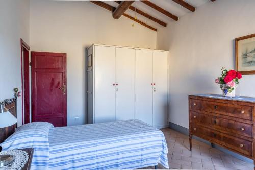 Postel nebo postele na pokoji v ubytování Agriturismo Il Torriano