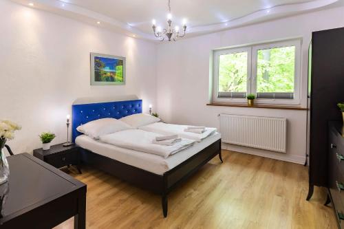 Posteľ alebo postele v izbe v ubytovaní VacationClub – Kapitańska 10 Apartament 3