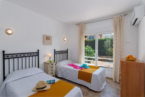 Postel nebo postele na pokoji v ubytování Villa Cabriel by Villa Plus
