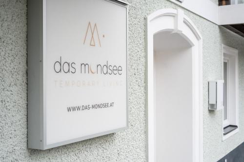 a sign on the side of a building at das mondsee in Mondsee