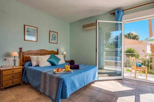 En eller flere senge i et værelse på Villa Mar Flores by Villa Plus