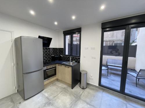 Kuchyňa alebo kuchynka v ubytovaní Marseille : Appartement T2 avec terrasse