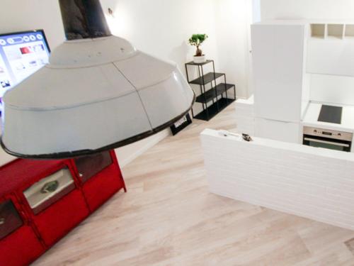 a living room with a red and white toy truck at Les Suites di Parma in Parma