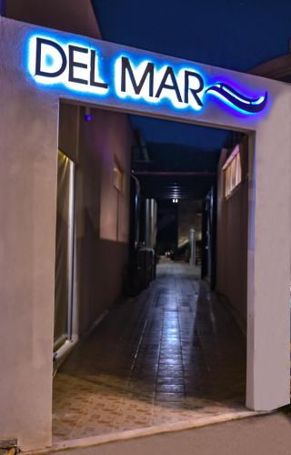 a sign for a del mar store in a hallway at Del Mar 'Adults Only' in Stalida