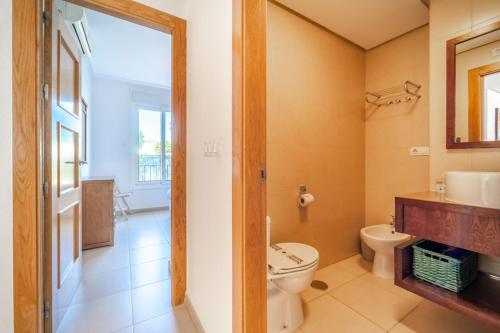 a bathroom with a toilet and a sink at Nice Groundfloor Apartment - BO202LT in Torre-Pacheco