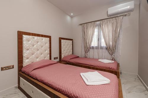 Ένα ή περισσότερα κρεβάτια σε δωμάτιο στο Villa Sofoklis