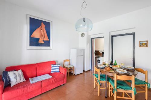 A seating area at Splendid Apartment PT-1 sul lago by Wonderful Italy