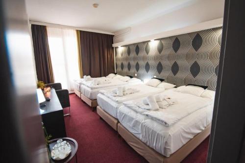  Hotel Lucia -  Room  picture :   Shower    TV    Hairdryer                           