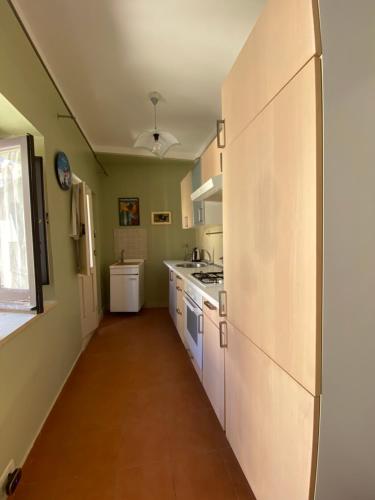 Kuchyň nebo kuchyňský kout v ubytování Forte Vigliena Apartment
