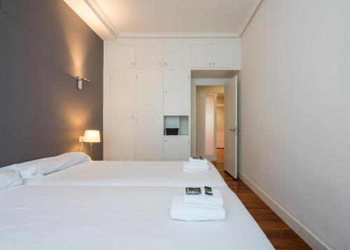 Postel nebo postele na pokoji v ubytování Ibarrola Apartment by People Rentals