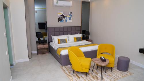 Ένα ή περισσότερα κρεβάτια σε δωμάτιο στο Clowzer Hotel Appartments