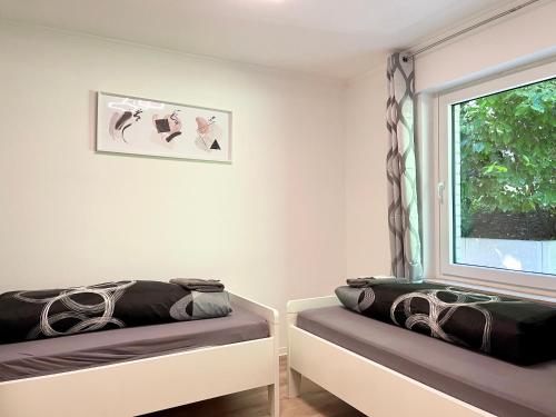 Katil atau katil-katil dalam bilik di Studios im Haus Deutsch Krone I home2share