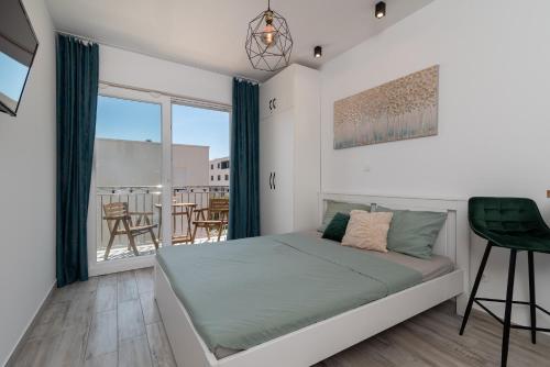 Katil atau katil-katil dalam bilik di Apartmani Princi Trogir