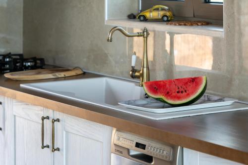Una cocina o cocineta en Kika Residences