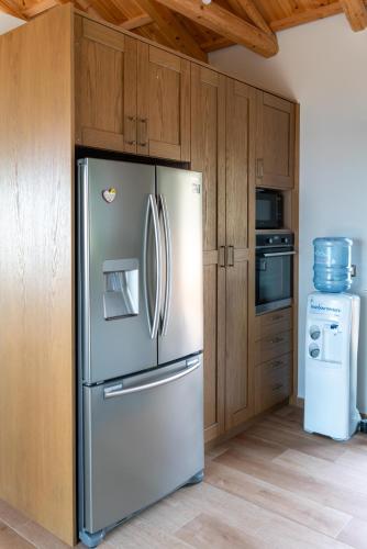 Una cocina o cocineta en Kika Residences