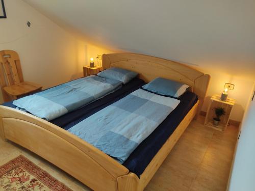 A bed or beds in a room at Casa completa - Camiño dos faros - Atlantico Malpica