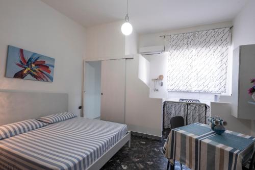 Ένα ή περισσότερα κρεβάτια σε δωμάτιο στο Case Vacanza La Pajara