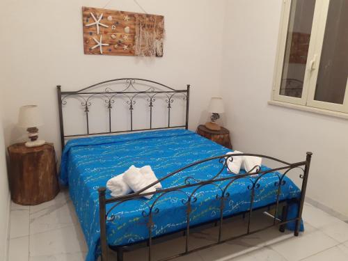 Posteľ alebo postele v izbe v ubytovaní casa vacanza crystal