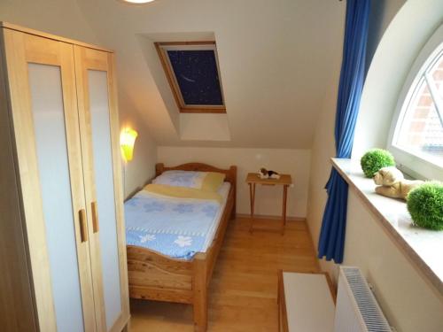 Un pat sau paturi într-o cameră la Njörd