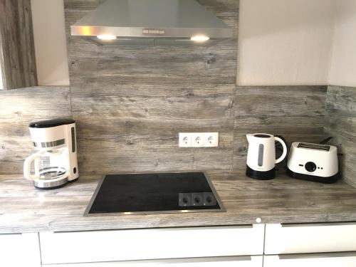 Una cocina o cocineta en Ostfriesenleev