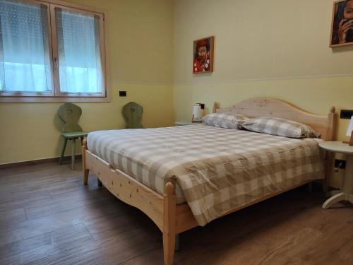 Giường trong phòng chung tại Agriturismo Corte Ambrosi