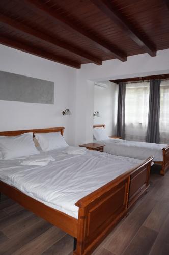 Un pat sau paturi într-o cameră la Casa Galand
